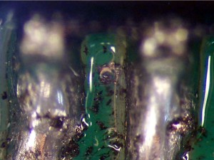 Residual fluxes and dross under conformal coating