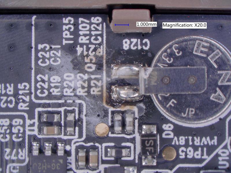 This onboard battery corroded not only the electrical components but also left a residue on the board, which aided in the leakage path and caused the batteries, when the camera did work, to last two weeks.