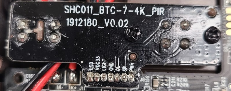 Both the motherboard and this daughter board show significant corrosion.