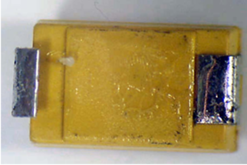 Mounting terminals under plastic encapsulation