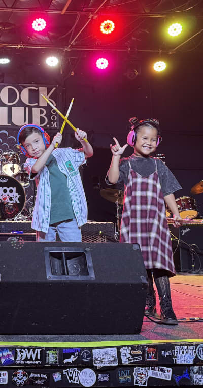 Asher and Pelaiah on stage