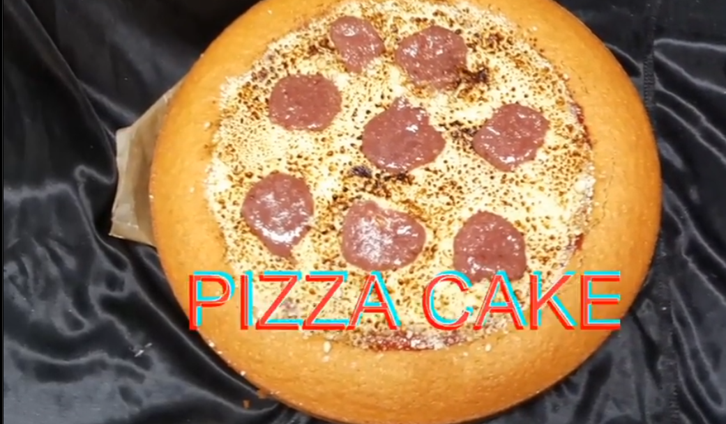 Pizza made out of cake, by chefbenchurchill on instagram