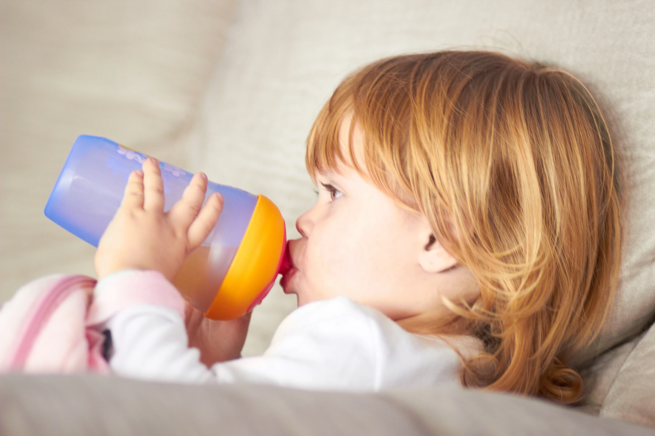 Shot of an adorable little girl drinking from a sippy cuphttp://195.154.178.81/DATA/istock_collage/0/shoots/781088.jpg