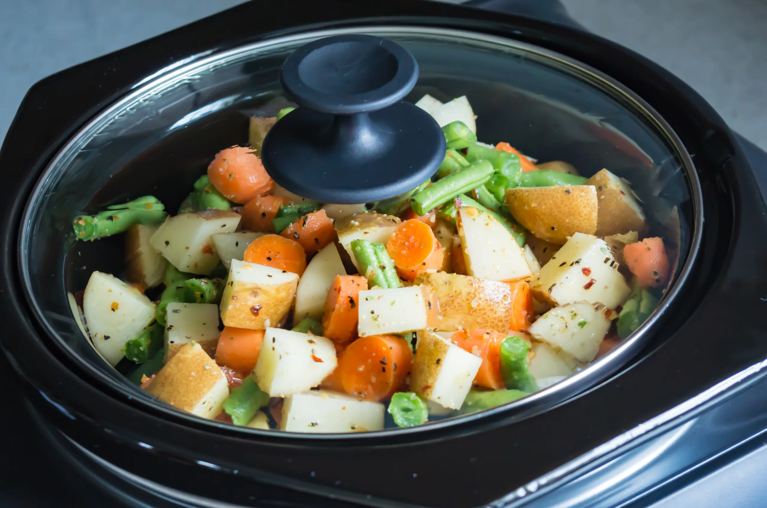 https://res.cloudinary.com/dy4kpnhxq/images/w_2560,h_1696,c_scale/f_webp,q_auto/v1702468759/slow-cooker-vegetables-stockpack-istock/slow-cooker-vegetables-stockpack-istock.jpg?_i=AA