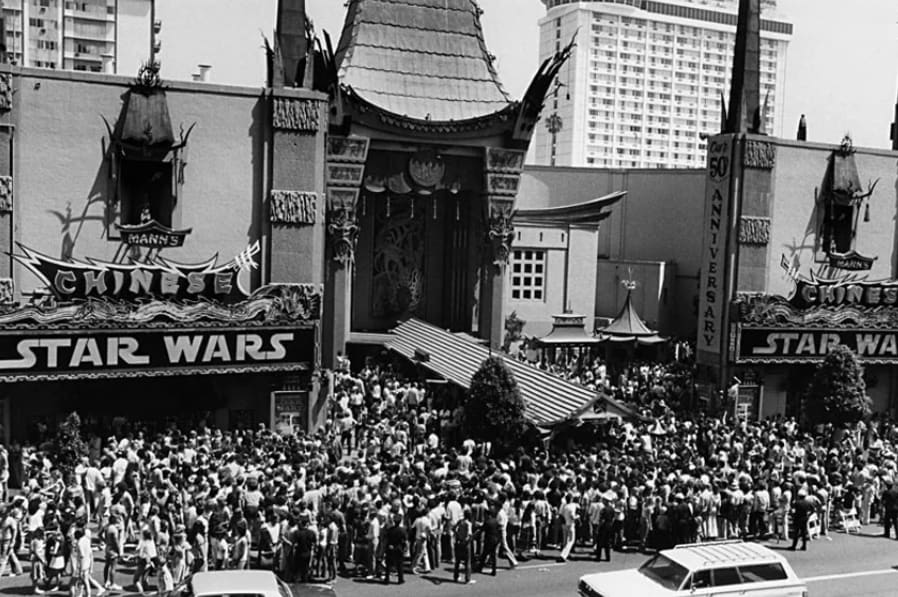 Crowd of people standing outside the Chinese Theater for the original Star Wars premiere - Reddit