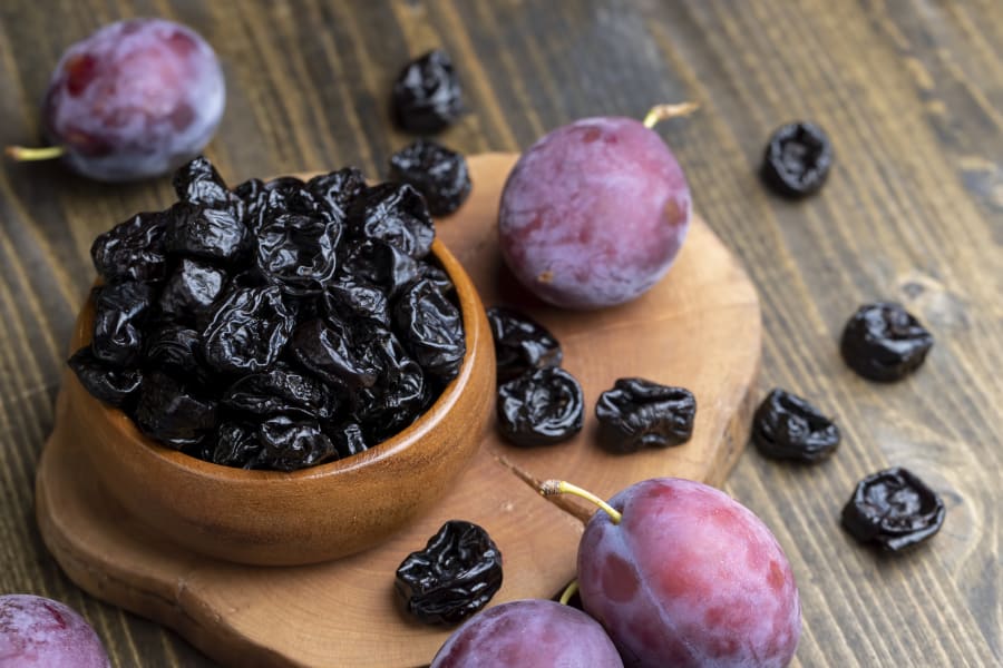 Black pile of prunes