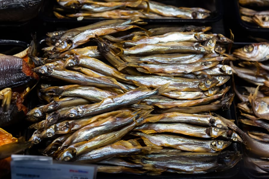 Cured herring and other fish in supermarket