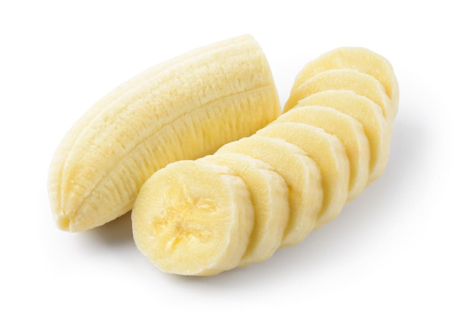 Banana slices and a half isolated. Bananas on white background. Banana slice with clipping path.