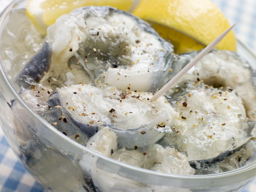 Bowl of Jellied Eels and Lemon Wedge