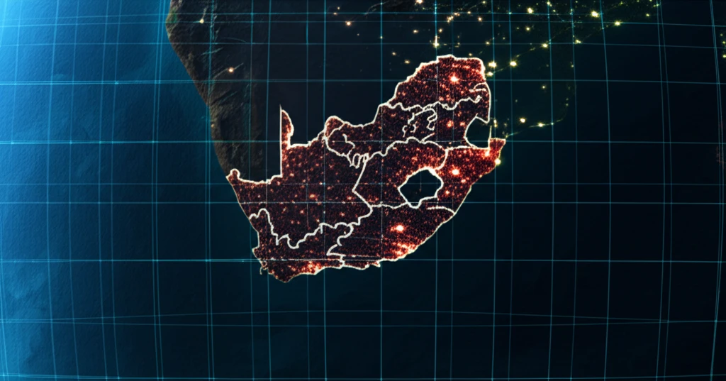 Nighttime view of South Africa from space, showing varying light intensities as indicators of economic activity.