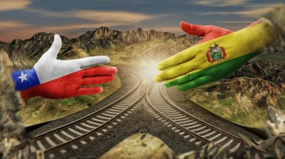 Hands reaching across the Andes, symbolizing Chilean-Bolivian collaboration.