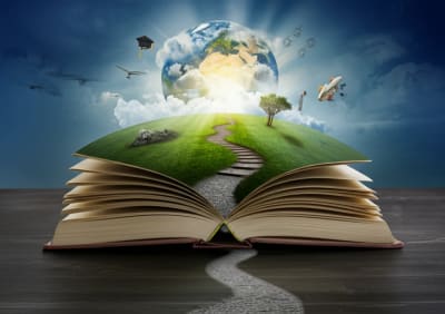 Open book with pathways leading to global landscapes, symbolizing adult learning journeys.