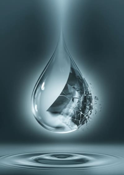 Surreal illustration of water droplet intertwined with medical x-ray, symbolizing water contamination by medical contrast agents.