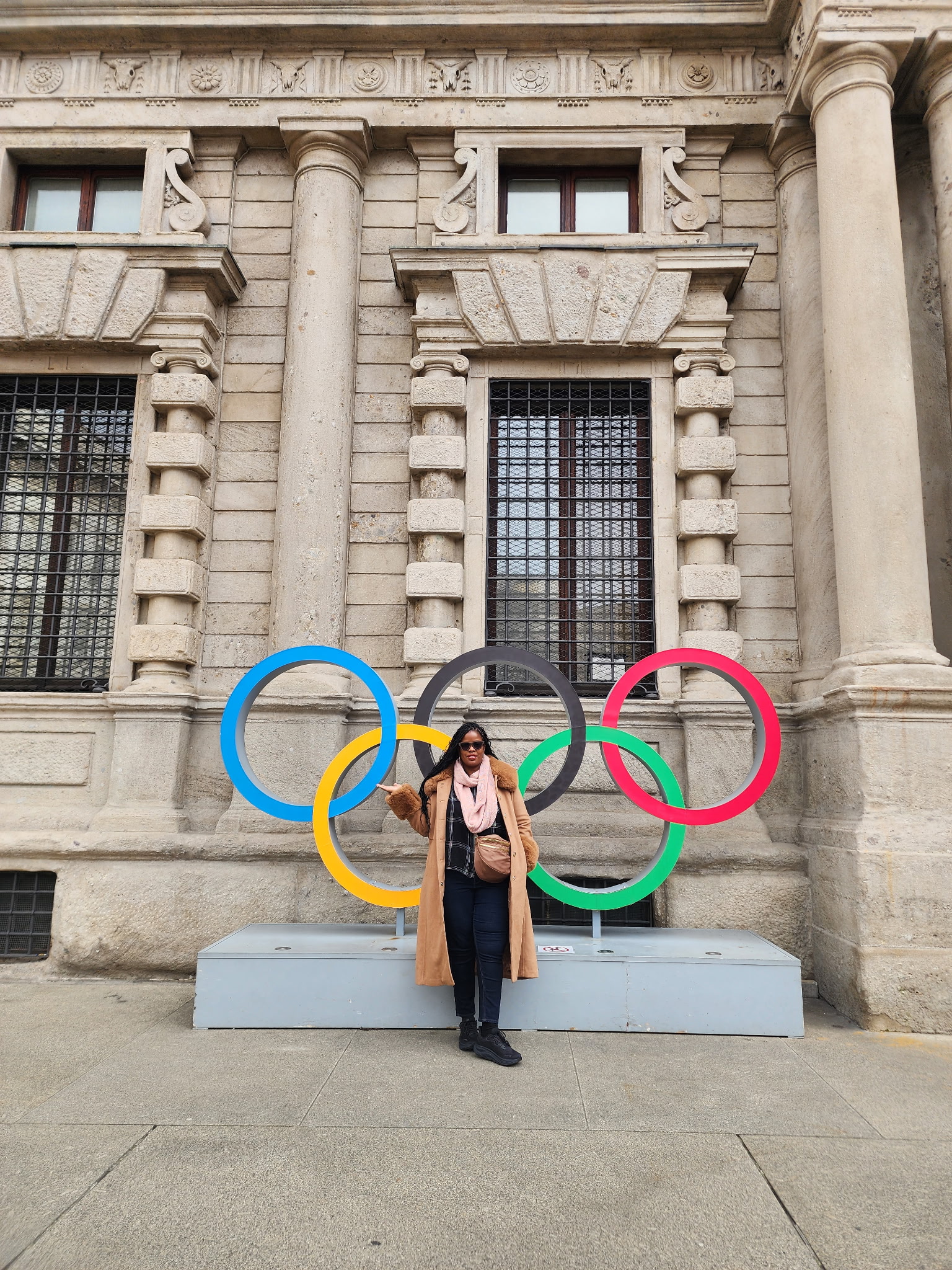 Porsche McCoy at the Olympic rings in Milan