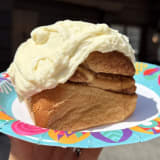Cinnamon Roll with Orange Cream Cheese Icing Image