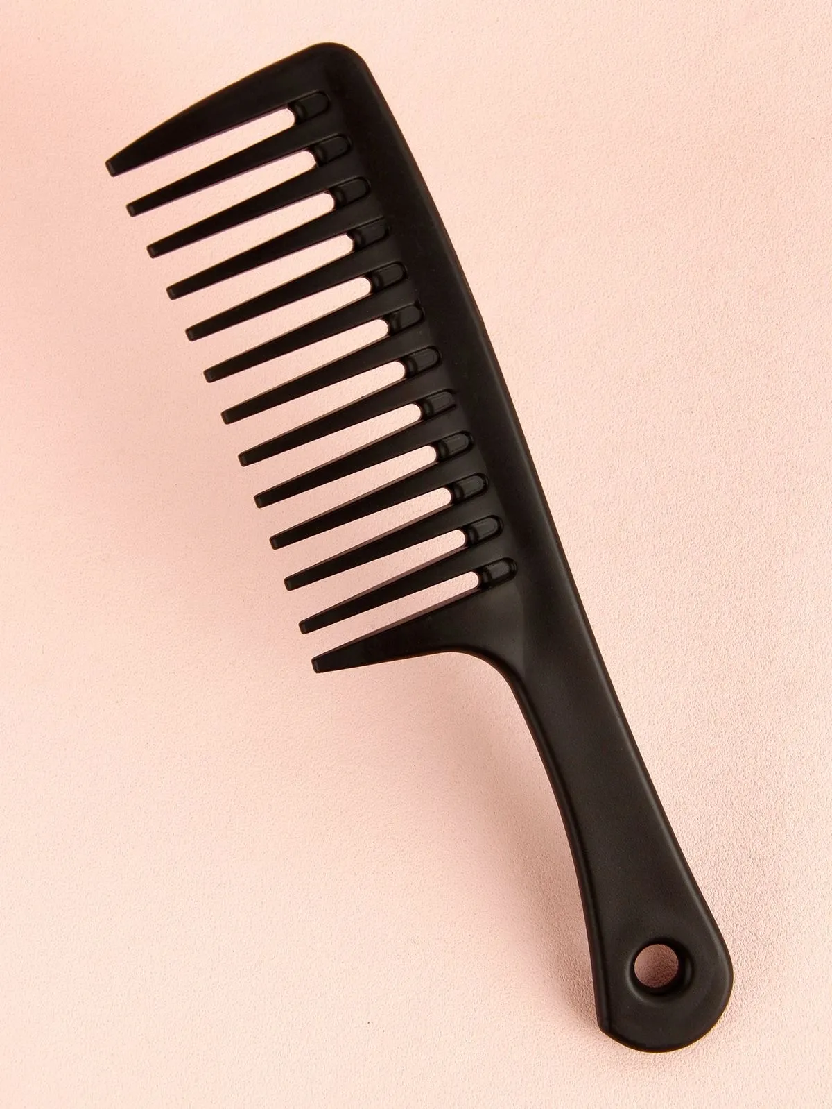 Wavy wide tooth mouth comb 