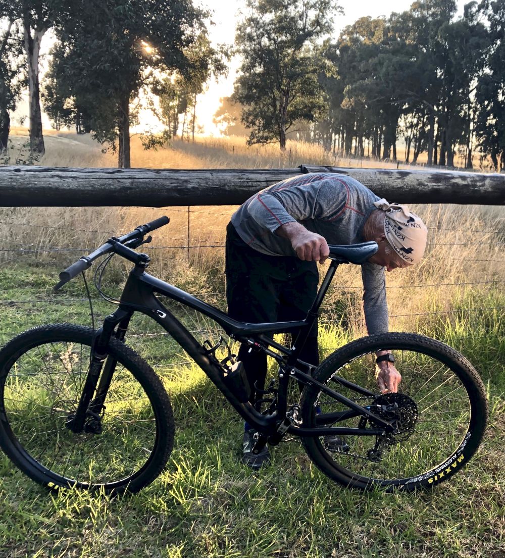 the old goat and his black mamba bicycle