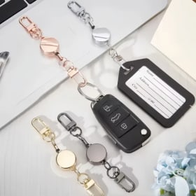 Llavero con insignia retráctil de Metal antirrobo con hebilla fácil de tirar llavero elástico accesorio de llavero de cuerda