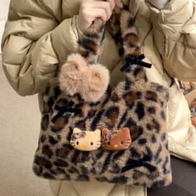 Bolso de mano de felpa con estampado de leopardo de Hello Kitty, bolso de hombro bonito y ligero para niñas, regalo ligero y duradero para niñas