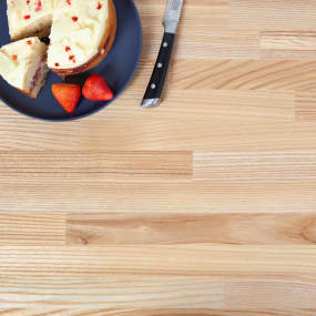 ash wooden kitchen worktop top view with cake