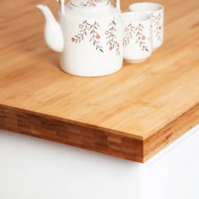 Caramel Bamboo kitchen worktop corner profile with teapot and tea cups