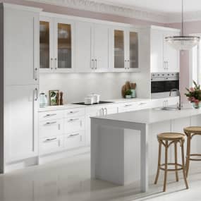 White quartz solid laminate worktop in white kitchen