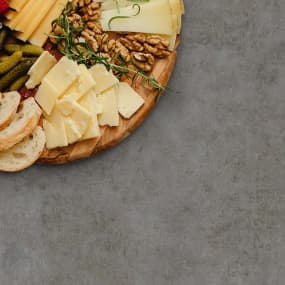 Industrial concrete laminate worktop swatch with cheese board