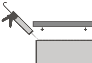 Silicone sealant should be used to fix solid FENIX NTM® worktops to base cabinets.