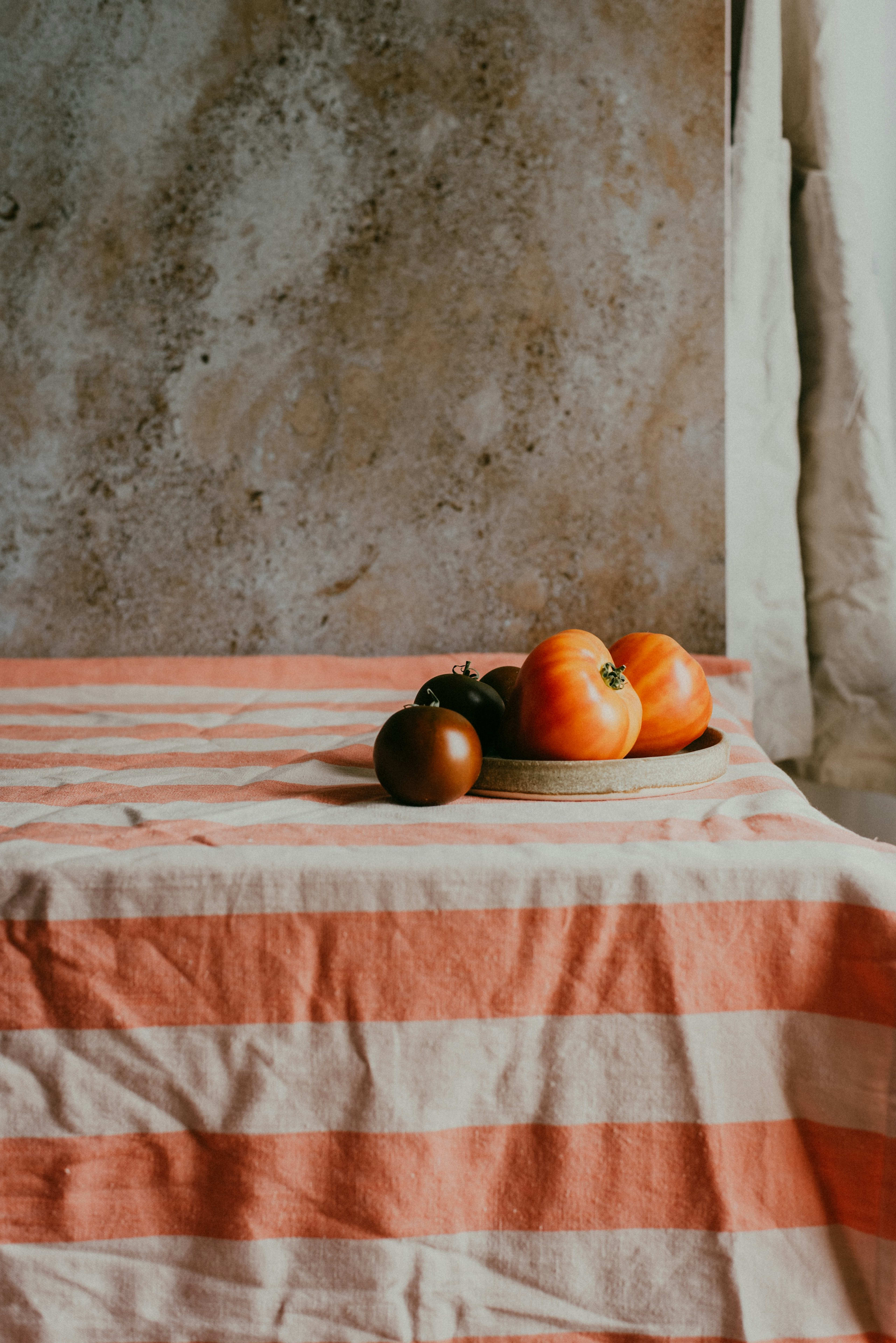Striped linen tablecloth with tomatoes