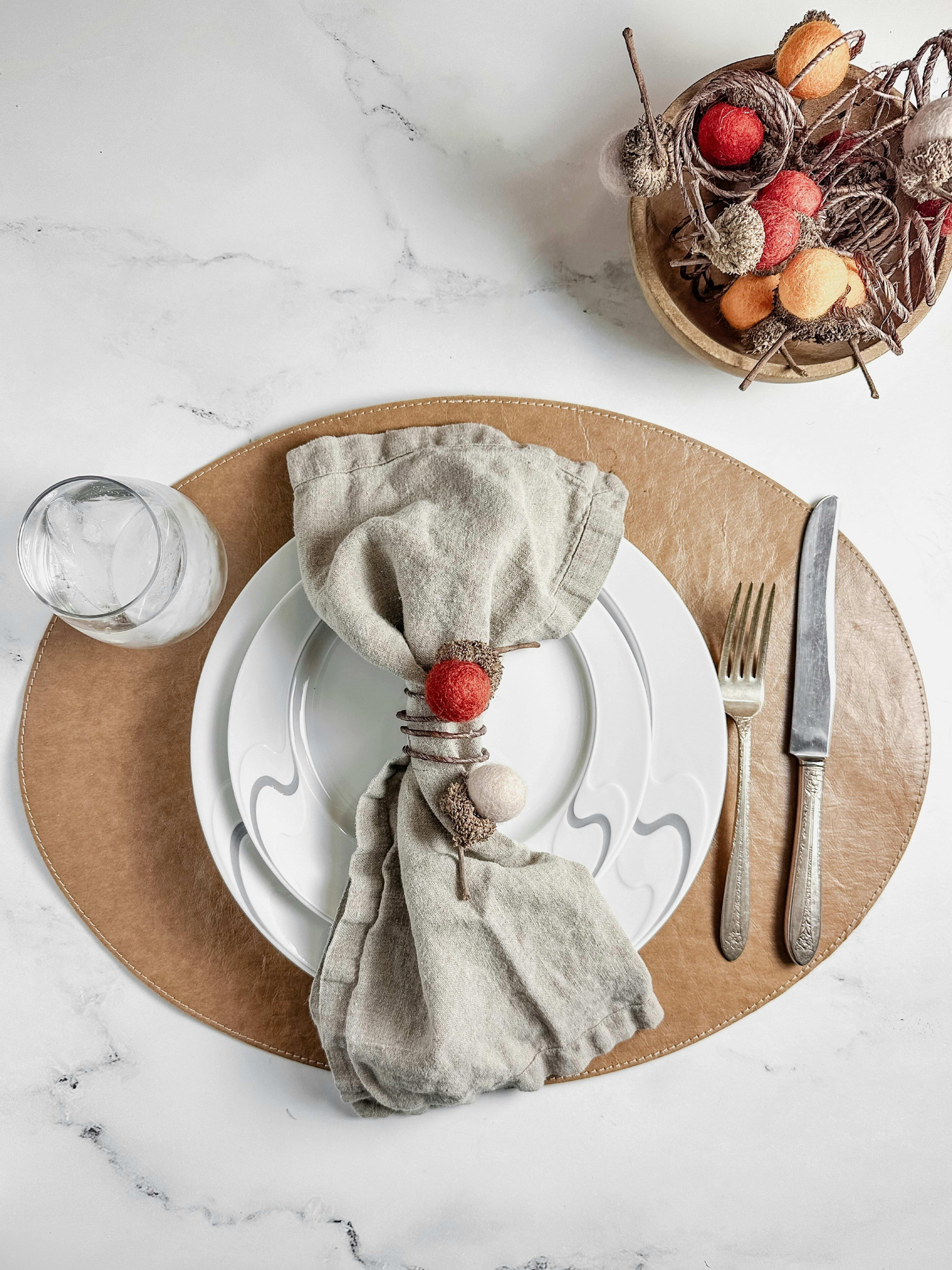 A styled place setting with linen napkin