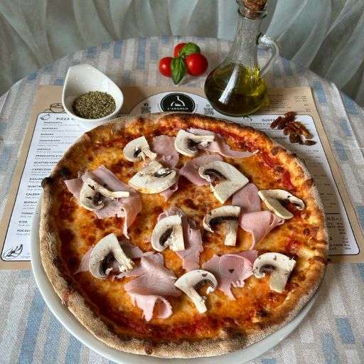 Prosciutto e funghi