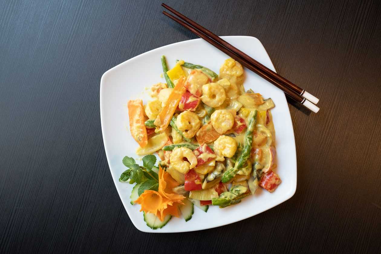 Creveti in sos curry
