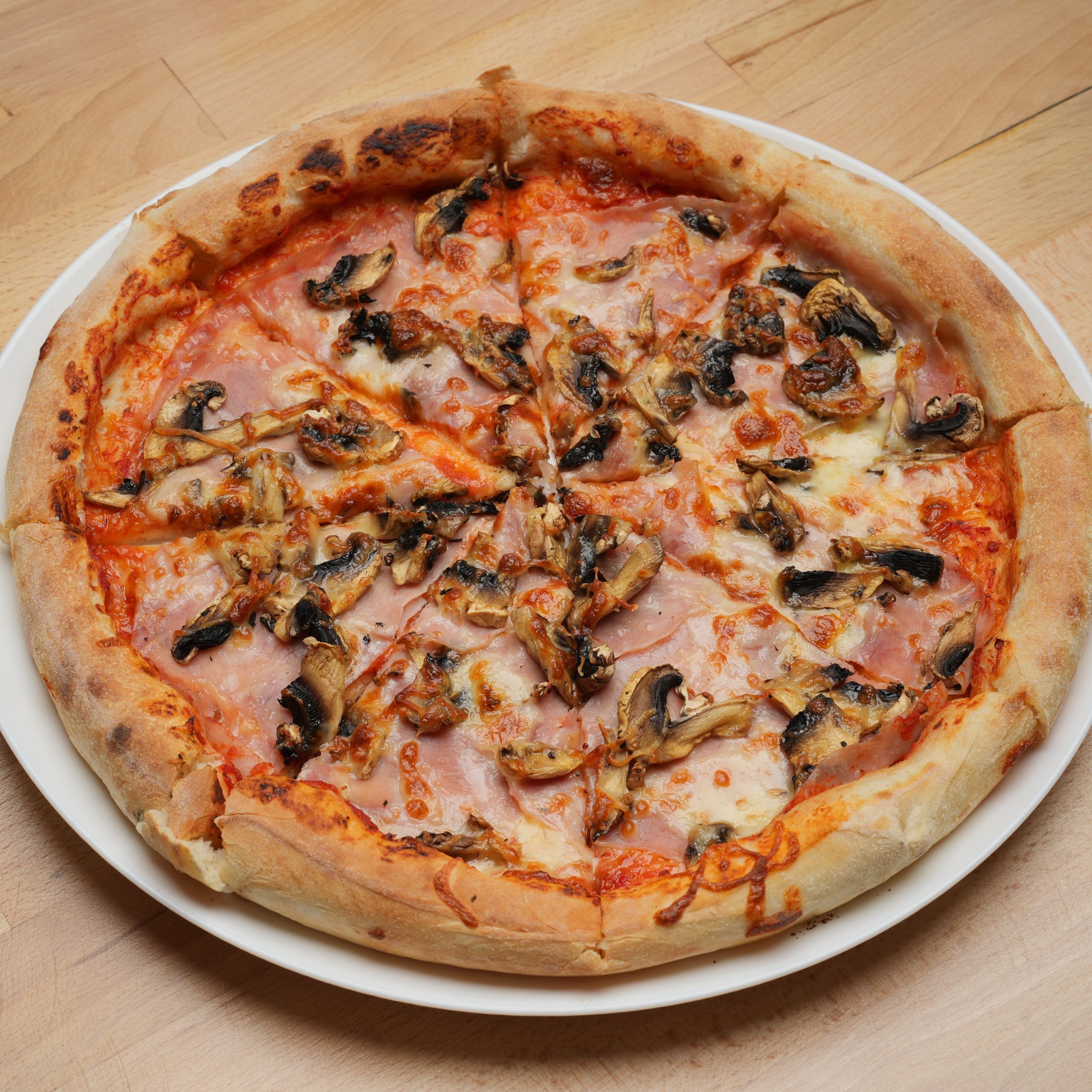 Pizza prosciutto e funghi