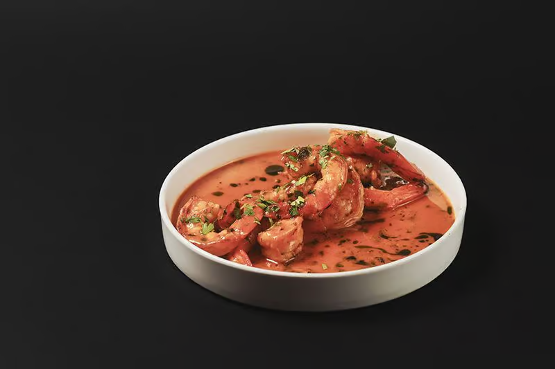 Creveți în sos de vin