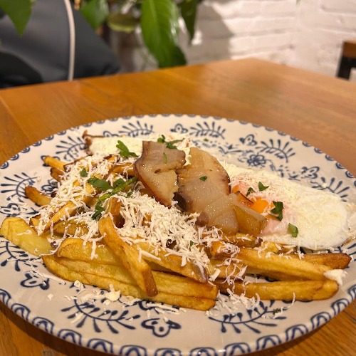 Fried Potatoes with Sunny-Side Up Eggs