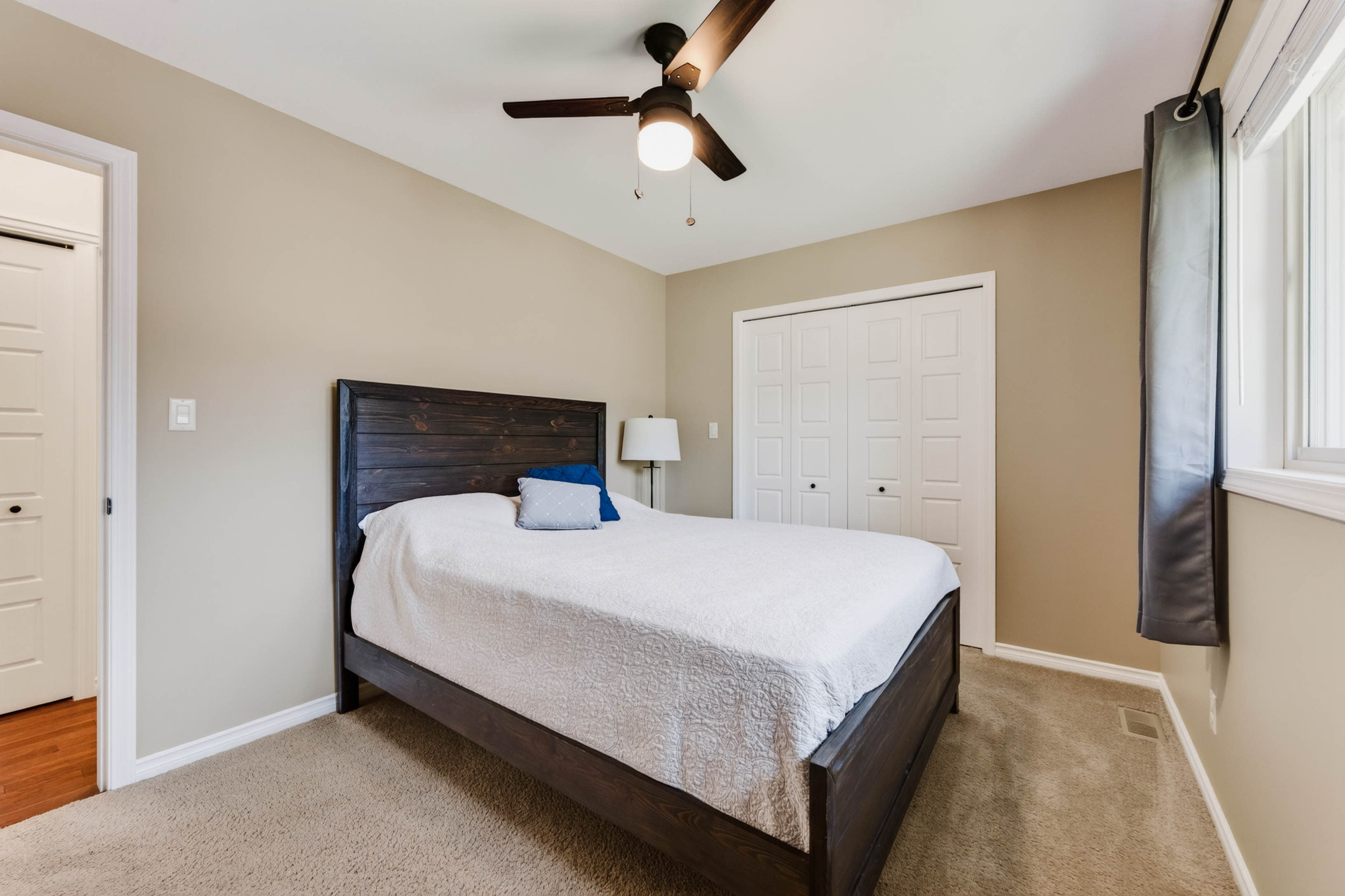 Bright second bedroom with generous closet space