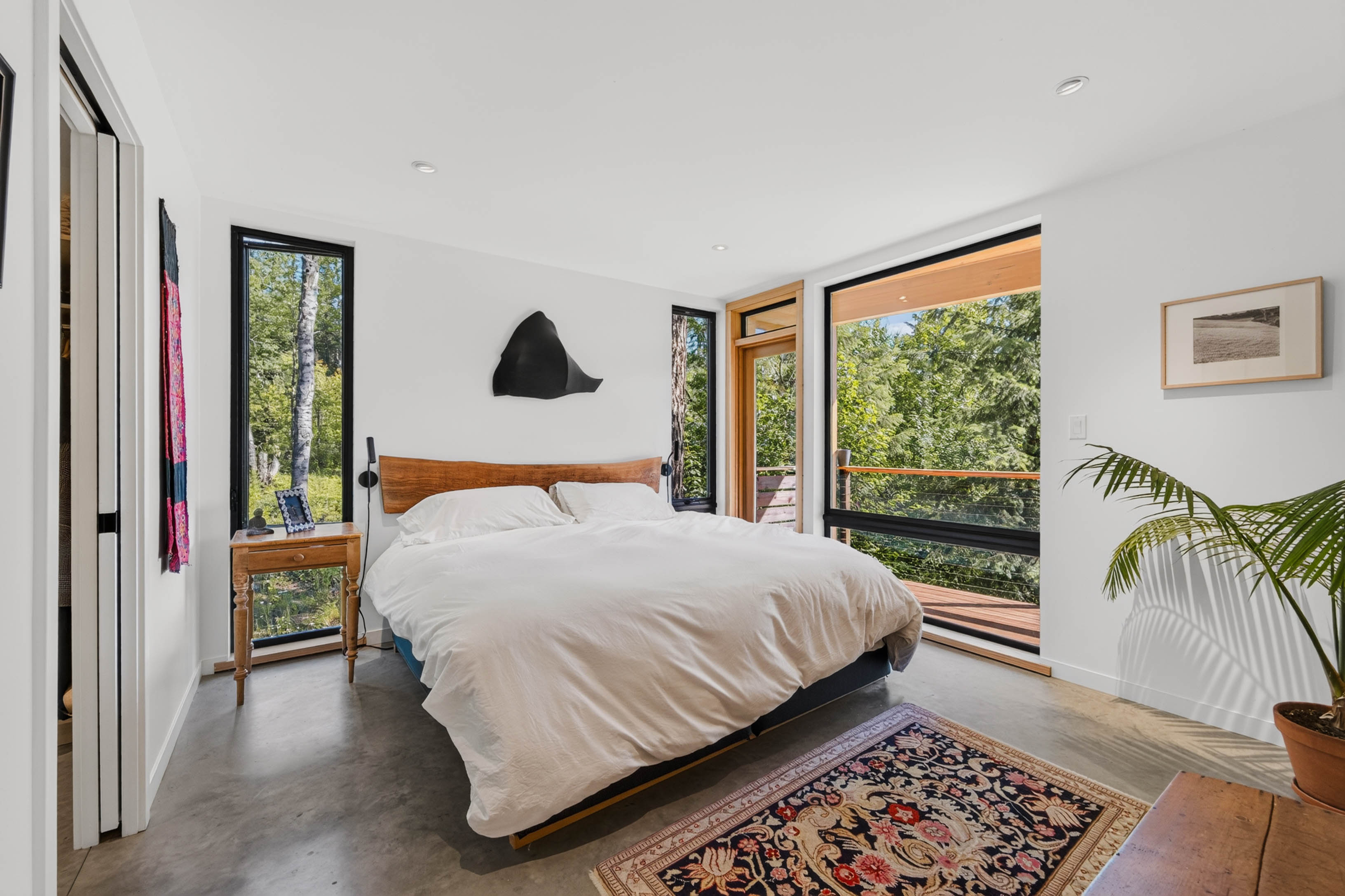 Bedroom at 4135 Kays Road with forest views