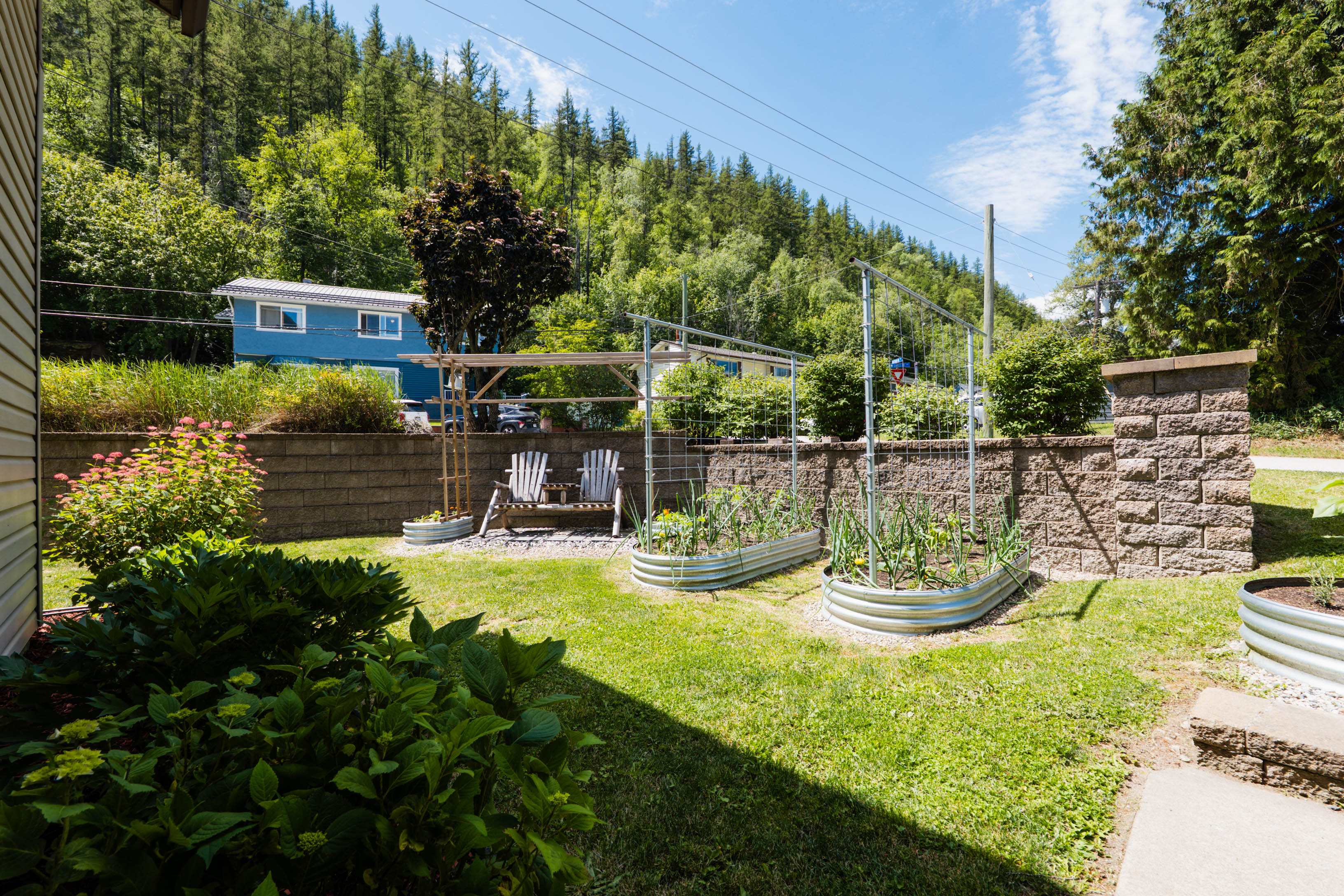 Landscaped garden area with raised beds