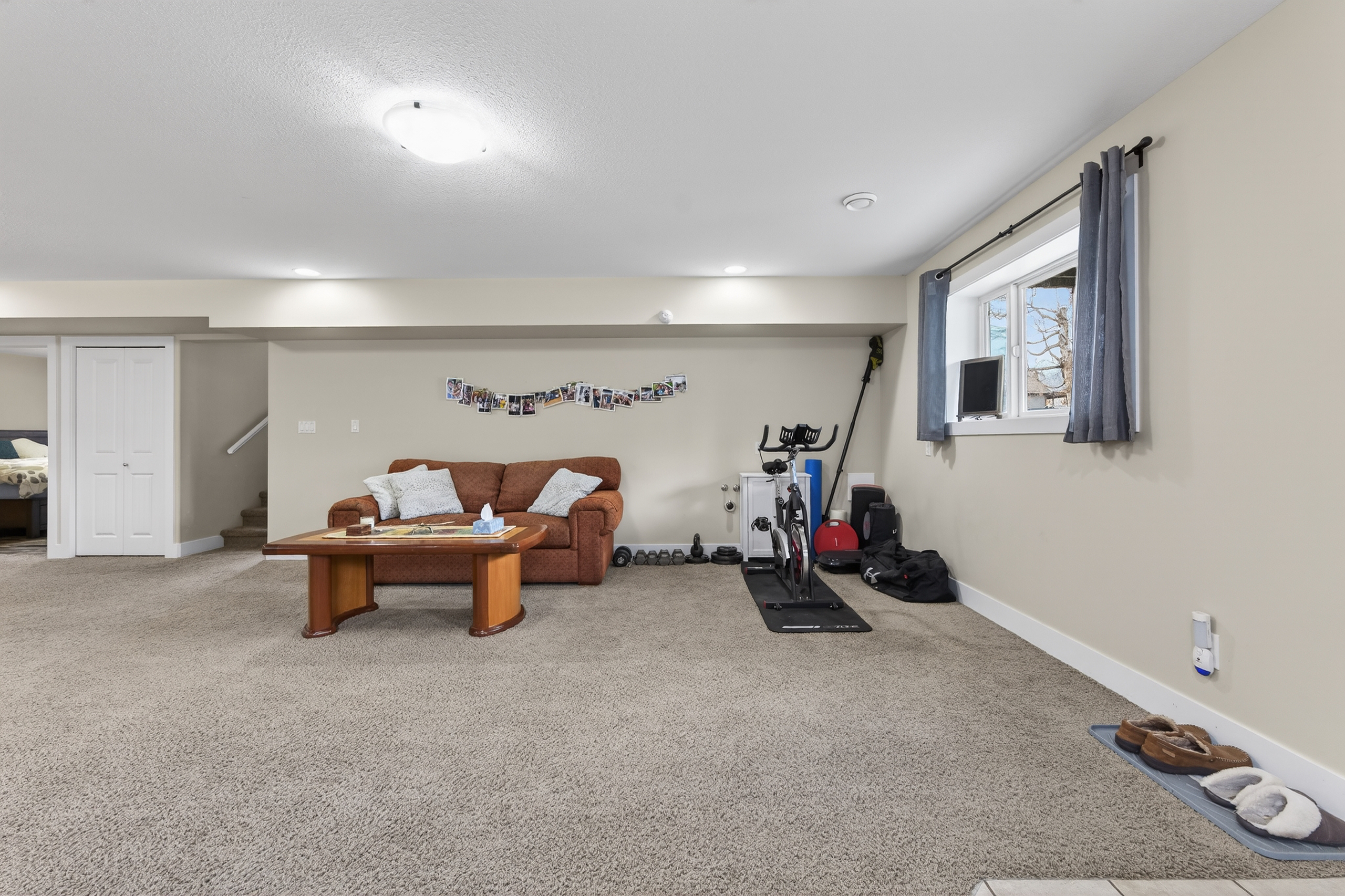 Spacious lower-level family room at 120 Kootenay Avenue