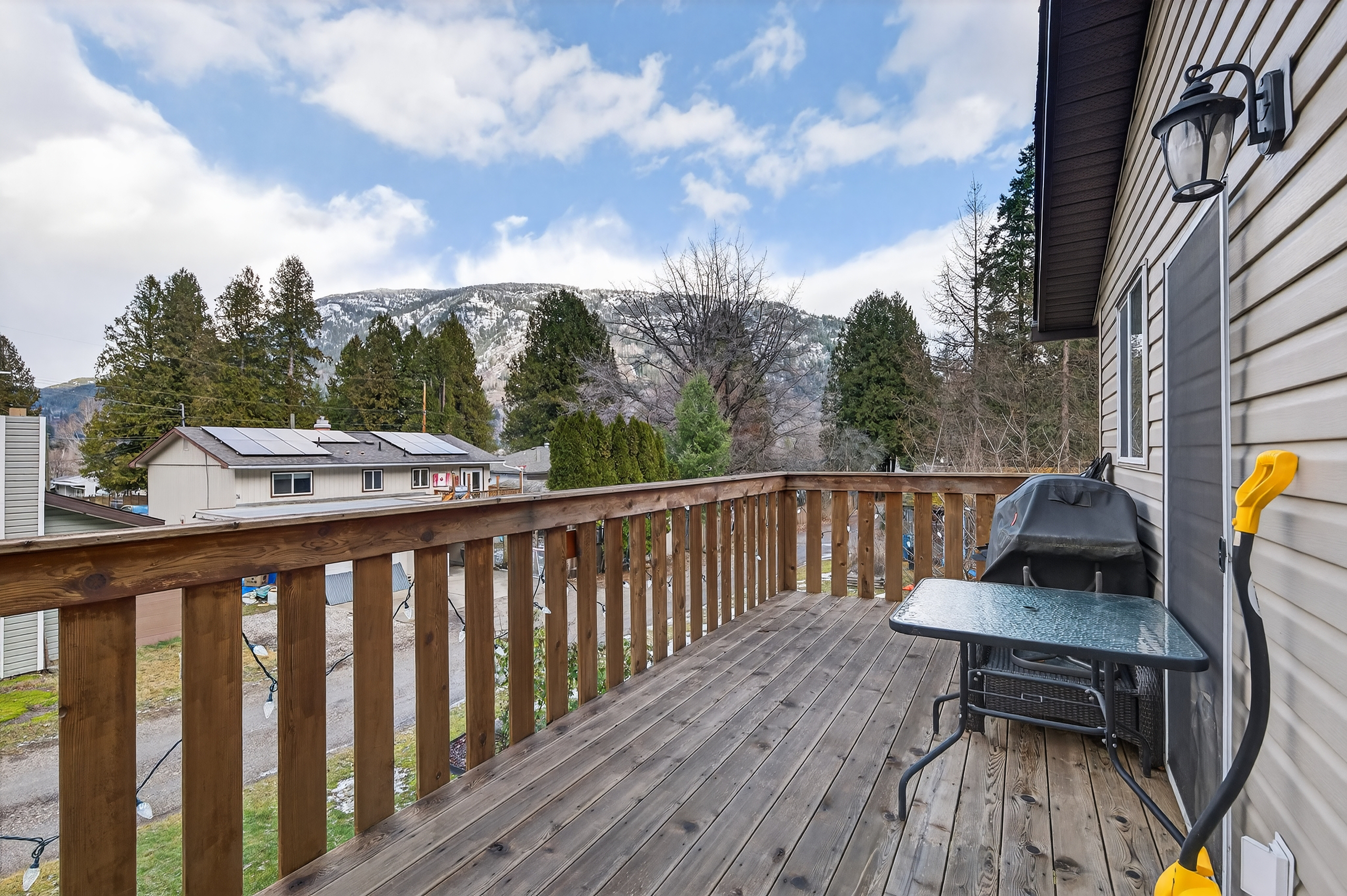 Deck with a mountain outlook in Castlegar
