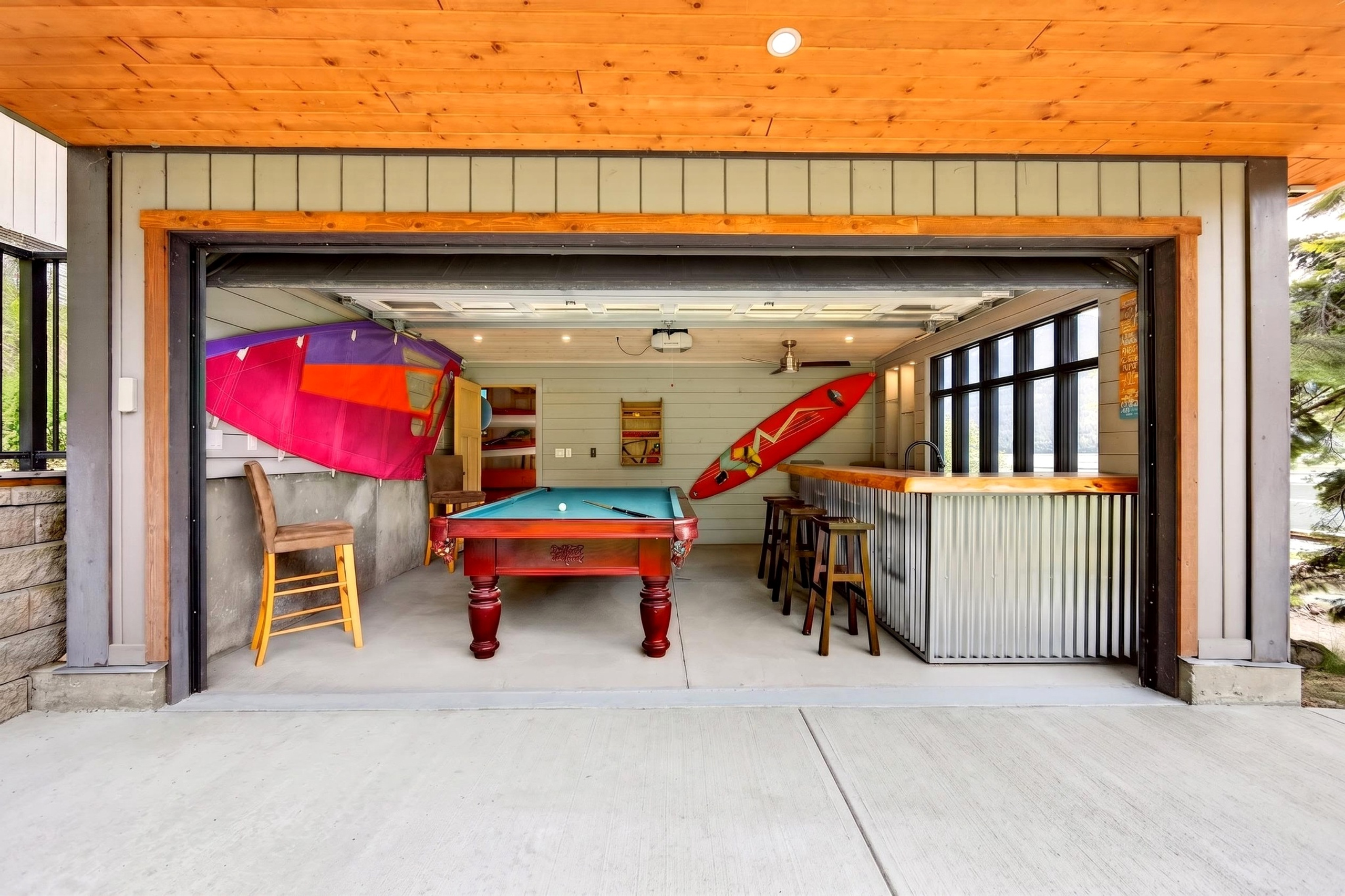 Boathouse-style games room and bar at 6506 Littlewood Road