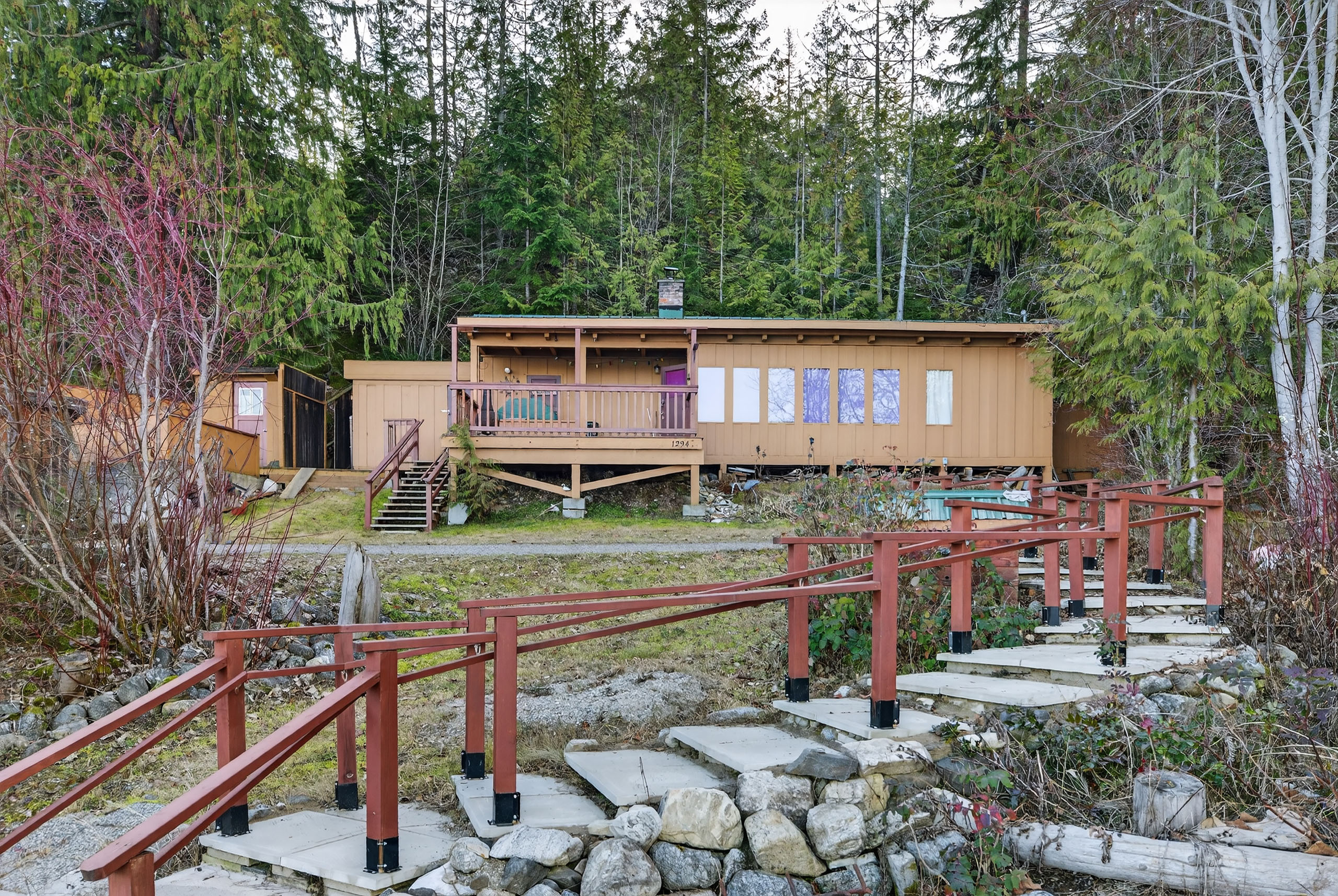 1294 Green Road cabin and pathway viewed from the shoreline