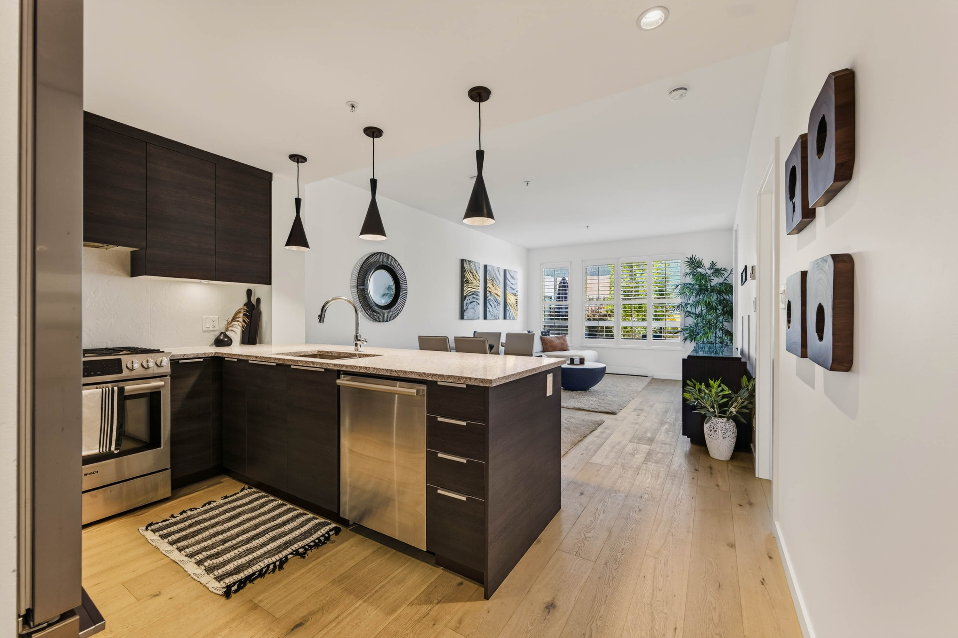 Contemporary kitchen opening to the living room