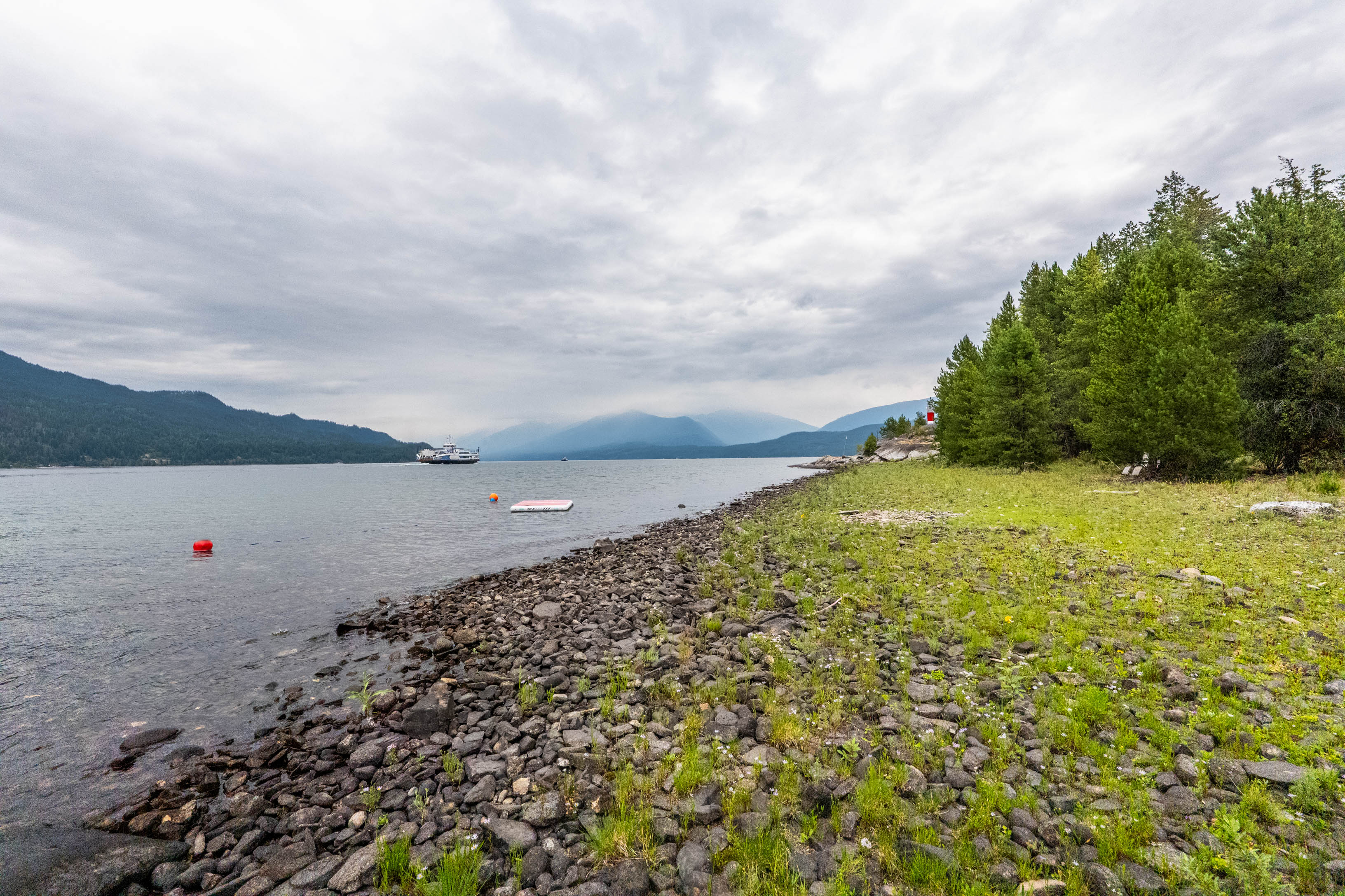 Long private shoreline and beach on Kootenay Lake