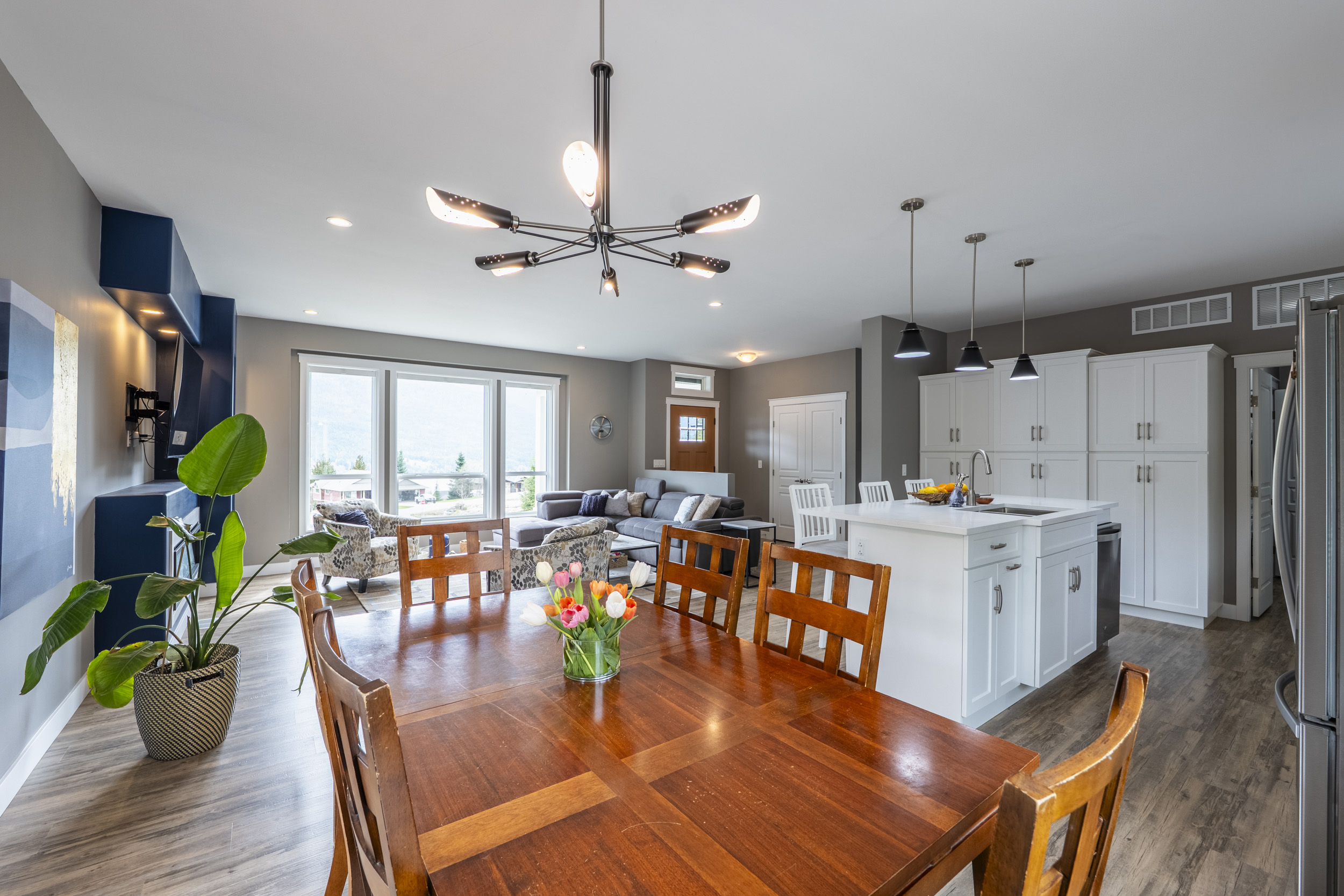 Open-concept kitchen dining and living area at 430 Buriview Drive
