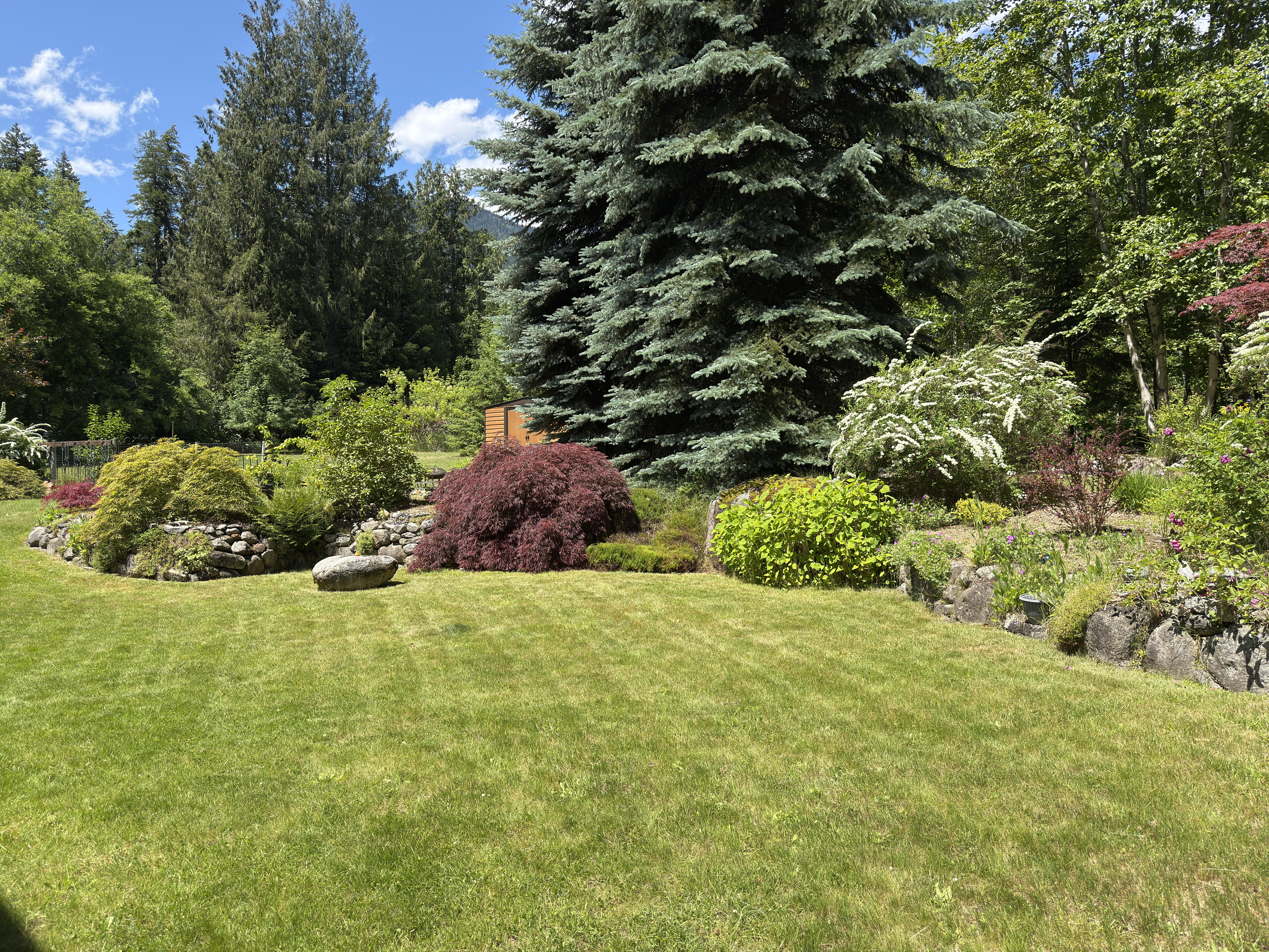Colourful landscaped garden at 7077 Beggs Road
