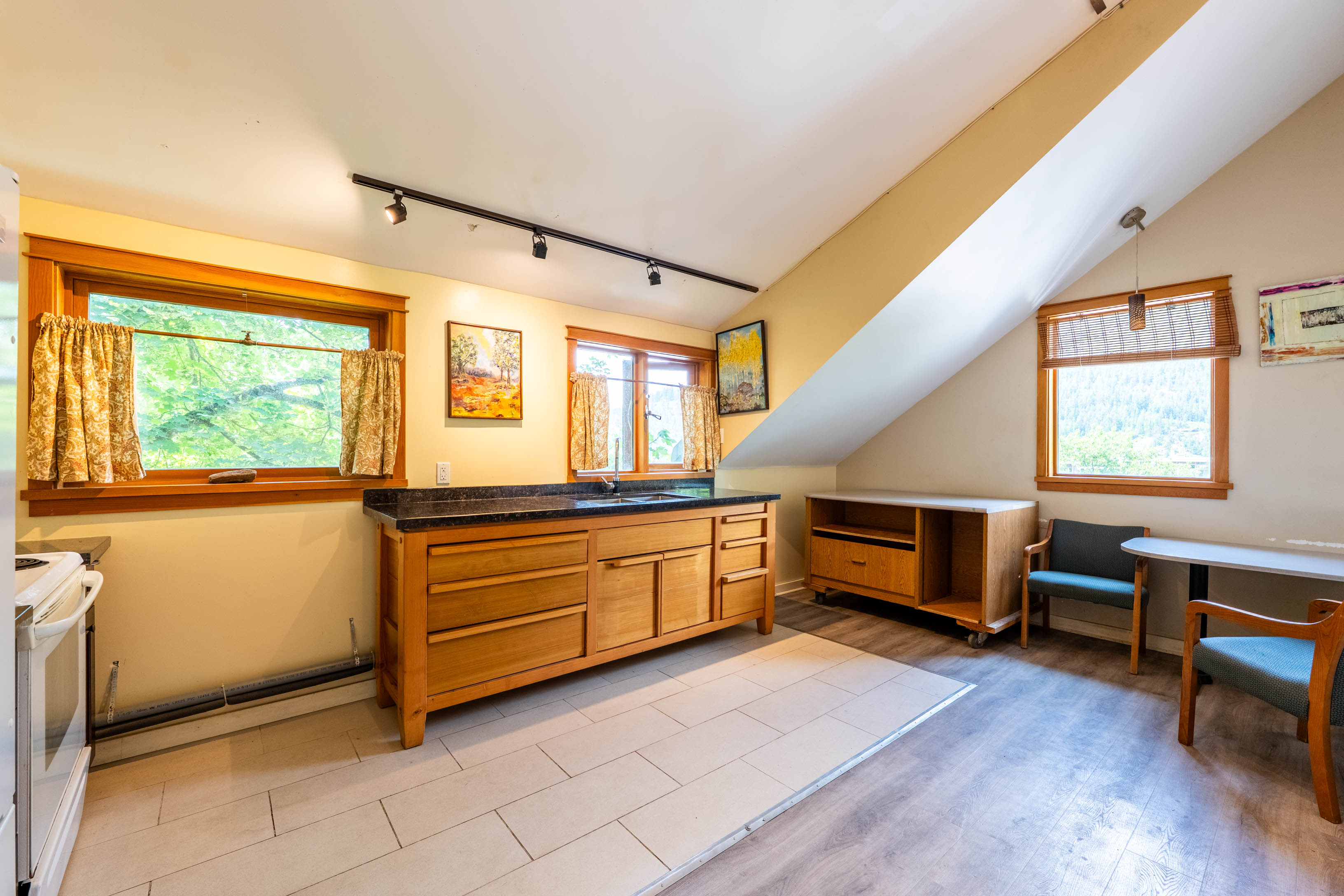 Self-contained one-bedroom suite kitchen and living area