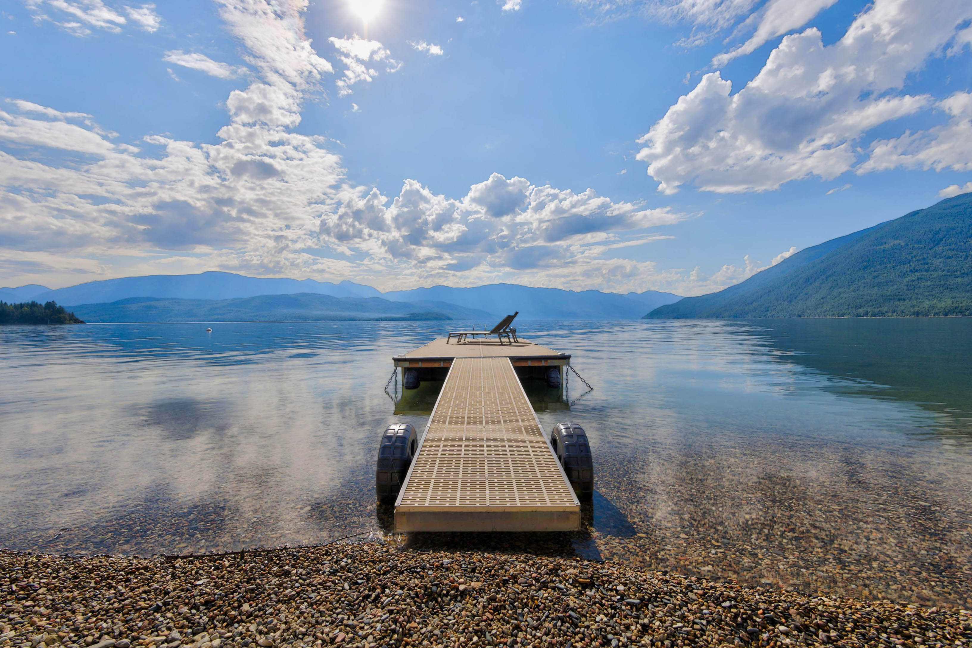 Chair at the end of a private dock on Kootenay Lake