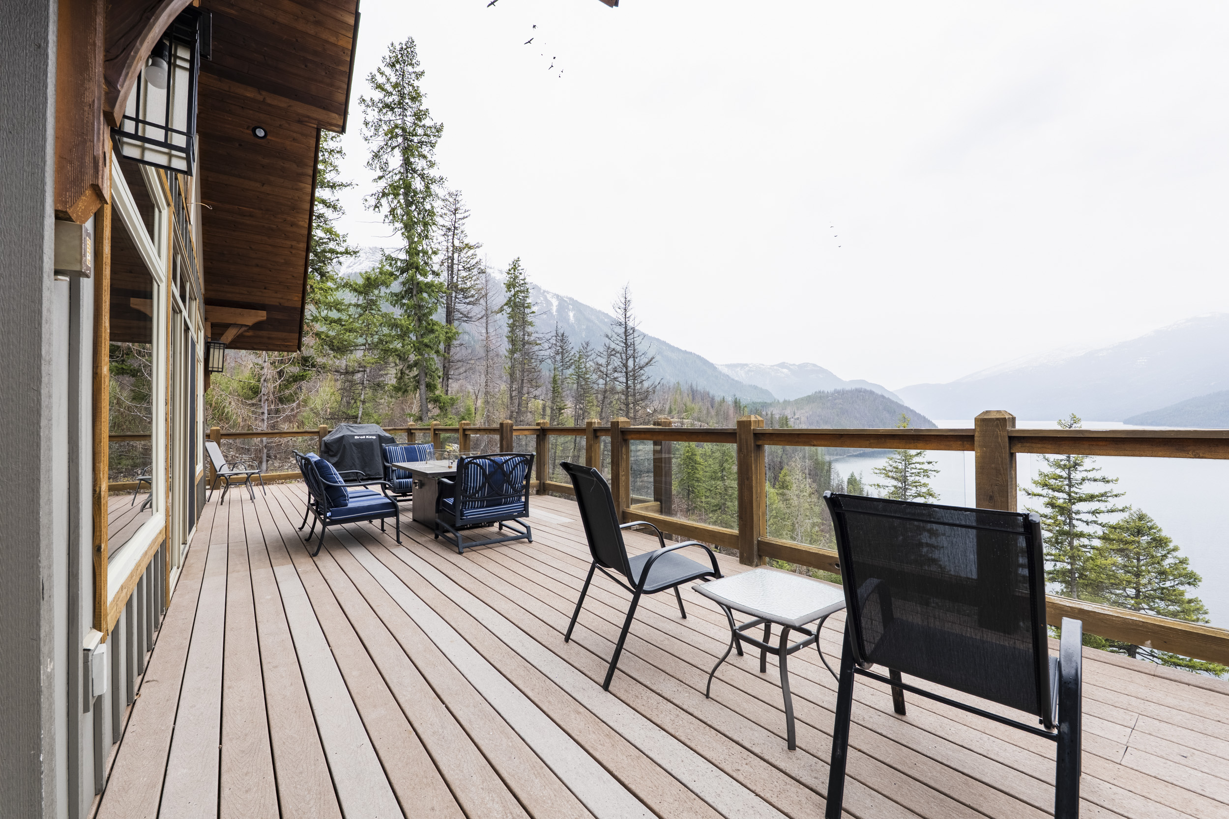 Expansive deck overlooking Slocan Lake and the mountains
