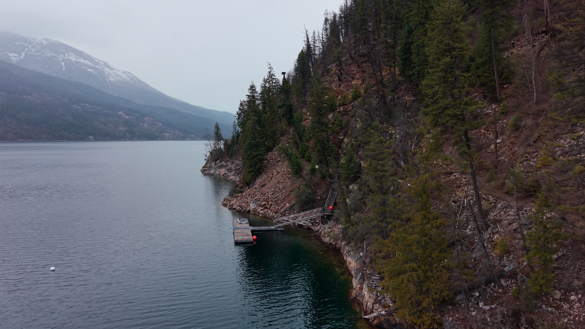 Slocan Lake shoreline and mountain landscape